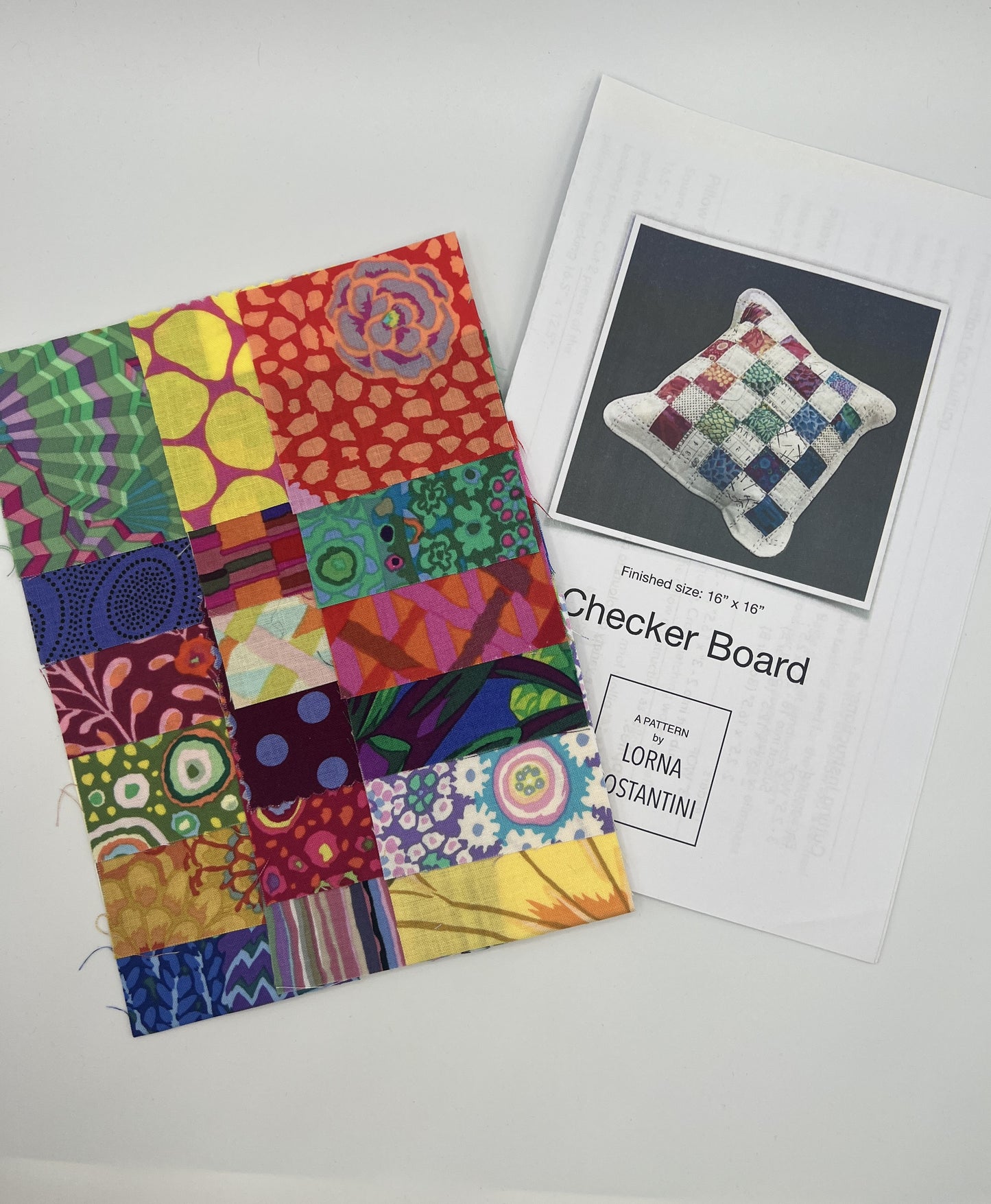 Checker Board Pillow Pattern  w/ Kaffe Fassett 2½" Mini Charms – 18 Pack designed by Lorna Costantini